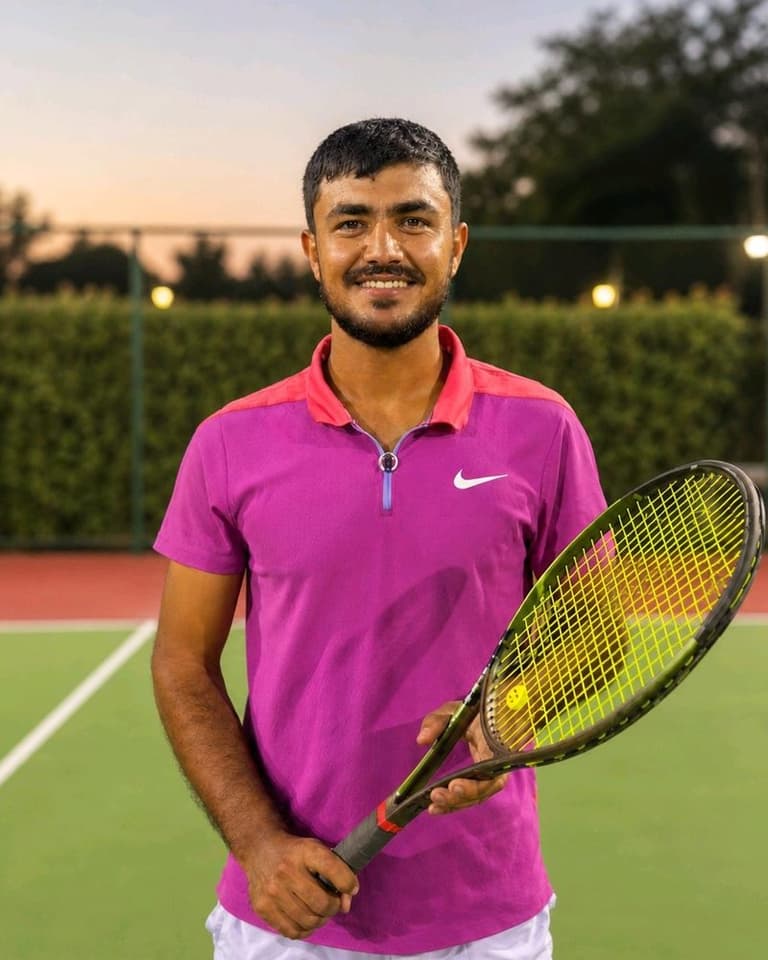AK Tennis coach Akhad Ermatov